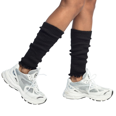 Pair of black basic leg warmers for women, 100% polyester, adult size, displayed on hanging card packaging, 90s old school style.