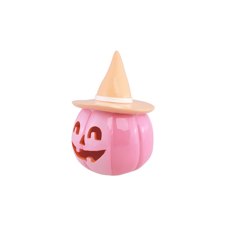 Citrouille Halloween rose vif à chapeau de sorcière pêche, vue de profil pour table d'Halloween