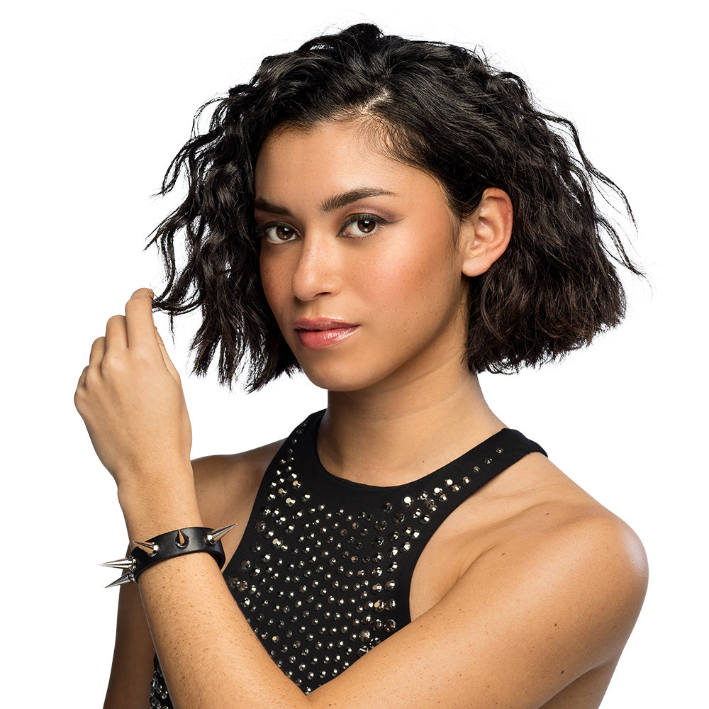 Black spike deluxe bracelet for women, rock and punk jewelry style, made of polyurethane, polycarbonate, and iron, displayed with hangtag.
