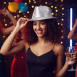 The image shows a silver sequin Borsalino-style hat, commonly used as a party accessory.