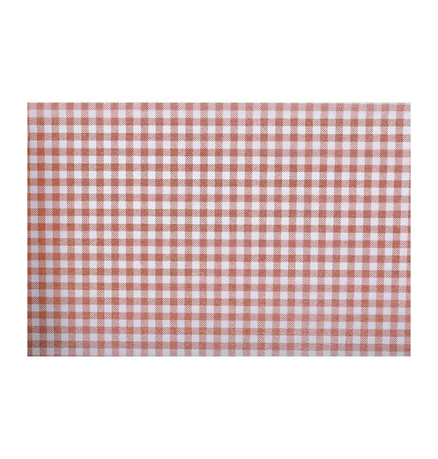 The image shows a red and white gingham (vichy) table runner, rolled out on a table, suggesting a classic and festive party table setting.