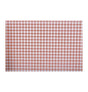 The image shows a red and white gingham (vichy) table runner, rolled out on a table, suggesting a classic and festive party table setting.