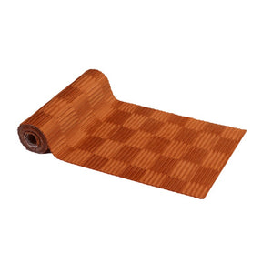 The image shows a terracotta-colored pleated velvet table runner displayed on a table, suggesting a decorative party table setting.