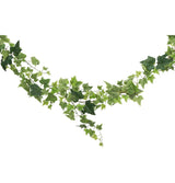 The image shows a decorative garland made of artificial variegated ivy leaves, designed for party or event decoration.
