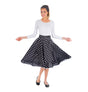 The image shows a black skirt with white polka dots and a matching headband, both designed as a two-piece set, likely intended for party or costume use.