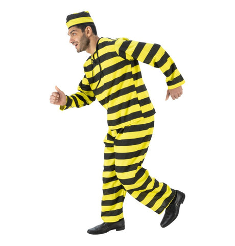 The image shows a man dressed in a prisoner costume, which consists of a black and white striped shirt, matching pants, and a matching cap. The outfit is a classic representation of a prisoner uniform, often used for themed parties or events.