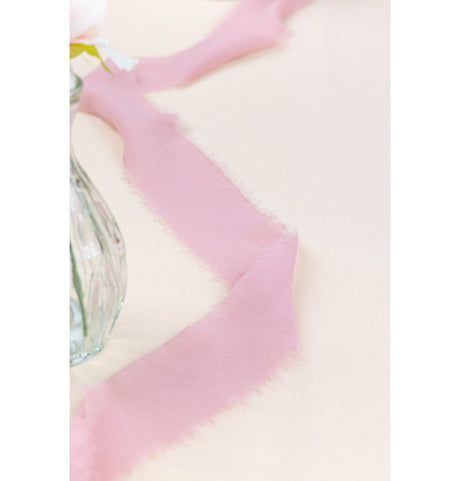 The image shows a decorative ribbon labeled "Touche de Vent Rose d'Ambre," which is pink in color and measures 4 cm in width and 5 meters in length.
